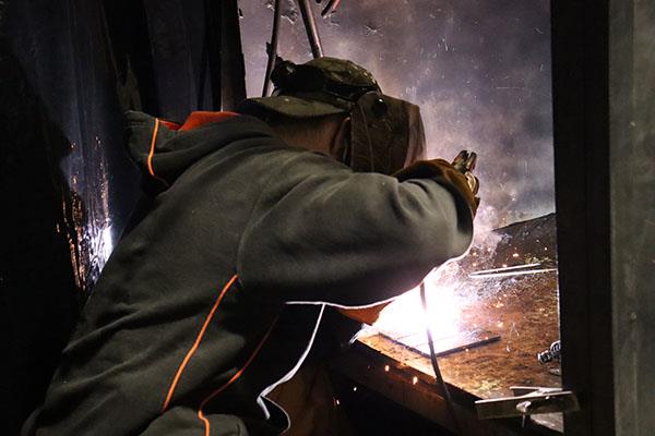 Student welding.