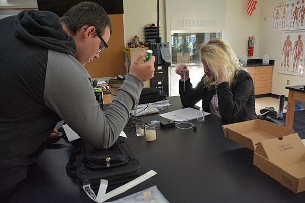 Students working on a science lab.
